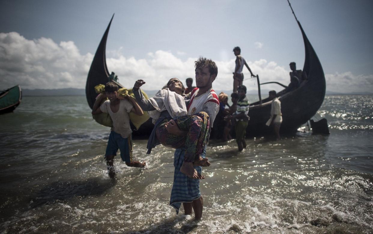 Myanmar's military attacked Rohingya Muslims, forcing them to flee their homeland and into Bangladesh - FRED DUFOUR/AFP via Getty Images