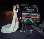 <p>The actress has shared the first image from her wedding to Matthew Koma and we’re pretty obsessed with her bridal gown.</p><p>The 32-year-old wore an ivory-crepe Jenny Packham backless and cape-sleeved gown with exaggerated shoulders for the occasion, while her husband donned a Celine tuxedo.</p><p>‘This,’ the Californian star captioned the photograph of her and her husband, in which they stand by a car with the words ‘just married’ written on the back window.</p><p>The <a href="https://www.elle.com/uk/life-and-culture/culture/a29586206/lizzie-mcguire-reboot-series/" rel="nofollow noopener" target="_blank" data-ylk="slk:Lizzie McGuire;elm:context_link;itc:0;sec:content-canvas" class="link ">Lizzie McGuire</a> star accessorised her look with a pair of drop earrings and a pearl-encrusted headband. </p><p><a href="https://www.instagram.com/p/B6Zh_Ymp31v/" rel="nofollow noopener" target="_blank" data-ylk="slk:See the original post on Instagram;elm:context_link;itc:0;sec:content-canvas" class="link ">See the original post on Instagram</a></p>