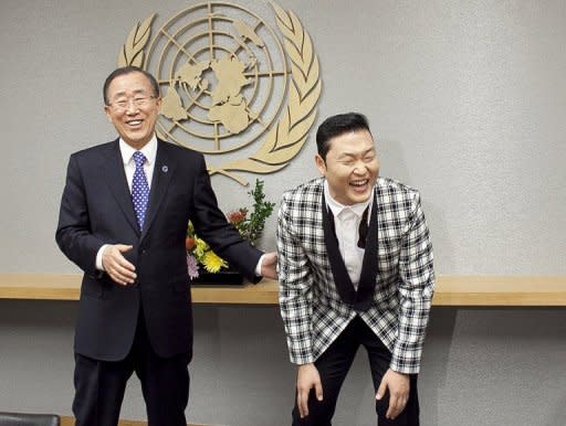 UN leader Ban Ki-moon, left, comes face-to-face with fellow South Korean and "Gangnam Style" rap phenomenon Psy