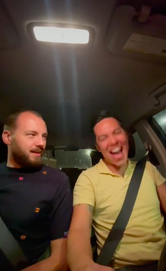 they're laughing in the car