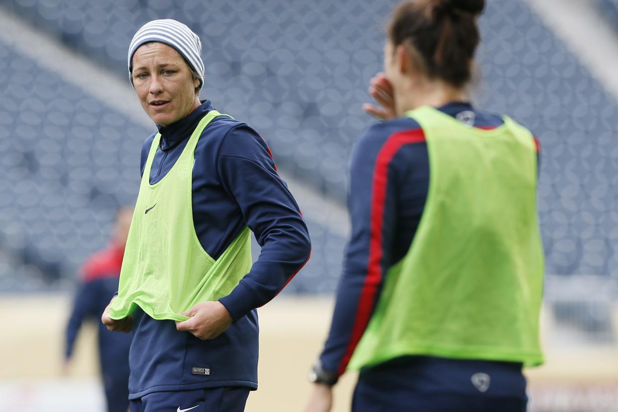 Team USA forward Abby Wambach takes a break during soccer practice in Winnipeg on Wednesday, May 7, 2014. Team USA faces Canada in a friendly match on Thursday, May 8 in Winnipeg. (AP Photo/The Canadian Press, John Woods)
