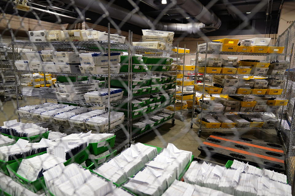 Ballots for the 2020 General Election in the United States are seen at Philadelphia's mail-in ballot sorting and counting center, Monday, Oct. 26, 2020, in Philadelphia. (AP Photos/Matt Slocum)