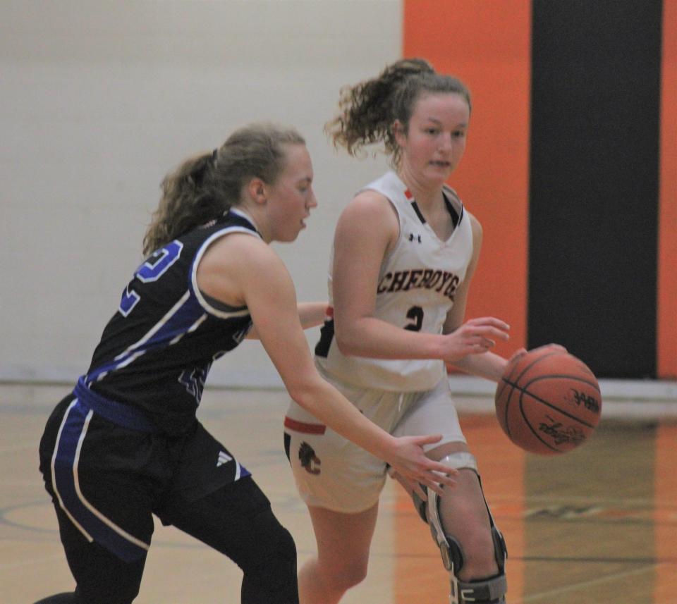 Cheboygan senior guard Emily Clark (right) looks to get past a Kalkaska player during Cheboygan's regular season finale on Thursday, Feb. 29. After years of injuries, Clark has had a healthy and successful final season with the Chiefs.