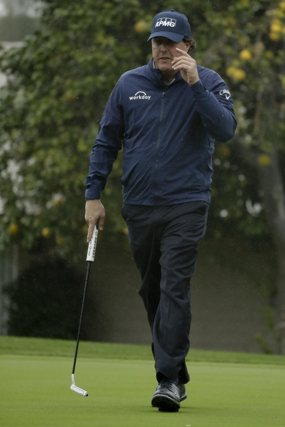 Phil Mickelson waves after making a birdie on the fifth hole during the first round of the Desert Classic golf tournament at La Quinta Country Club on Thursday, Jan. 17, 2019, in La Quinta, Calif. (AP Photo/Chris Carlson)