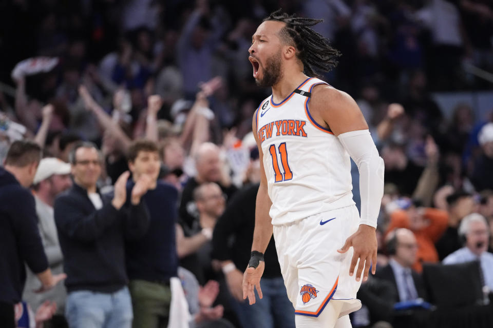 New York Knicks guard Jalen Brunson reacts after scoring a three-point basket in the first half of Game 4 in an NBA basketball first-round playoff series against the Cleveland Cavaliers, Sunday, April 23, 2023, at Madison Square Garden in New York. (AP Photo/Mary Altaffer)