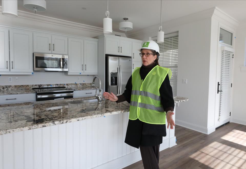 Ashley Wade, the Executive Director is pictured in the kitchen area of a Hutchinson apartment, in the East Apartment Homes under construction at the Broadview Senior Living at Purchase College complex in Purchase, photographed Nov. 15, 2023.