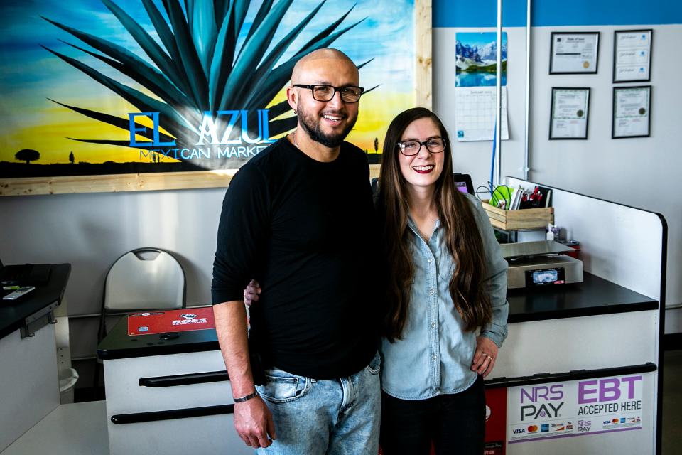 Edgar Reynoso Ayala, left, and Sara Puffer stand inside El Azul Mexican Market at 415 Community Drive in North Liberty, Iowa, on Wednesday, Jan. 11, 2023.