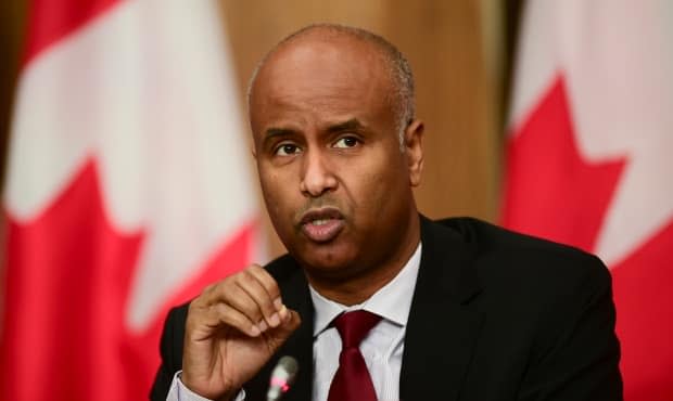 Minister of Families, Children and Social Development Ahmed Hussen announced the territory would be receiving $19.2 million to address housing issues in the N.W.T.   (Sean Kilpatrick/The Canadian Press - image credit)