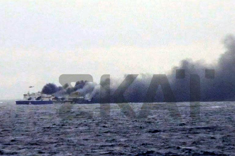 A photo grab from Greek television channel Skai shows burning ferry the Norman Atlantic on December 28, 2014