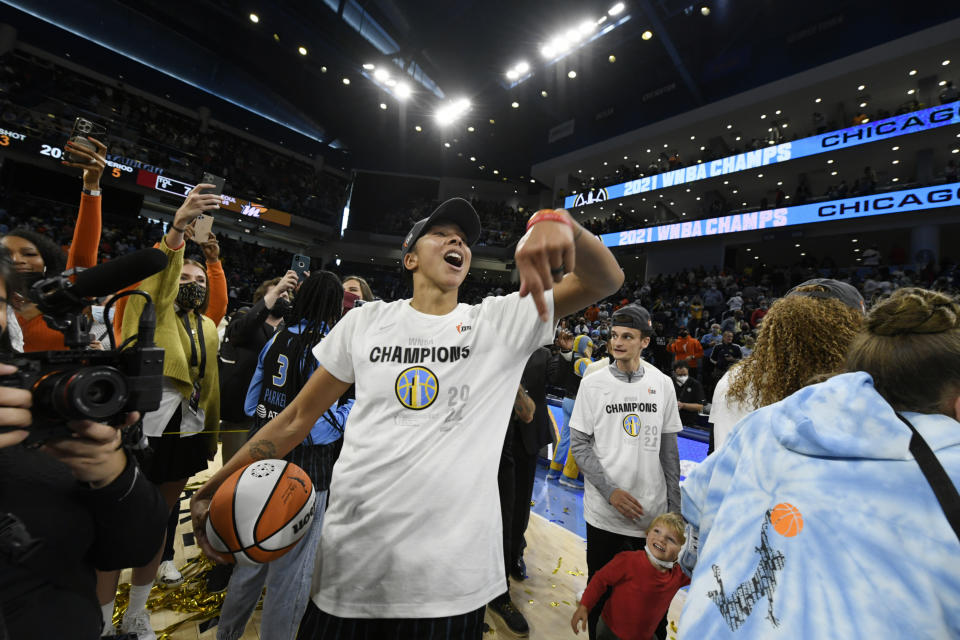 FILE - Chicago Sky's Candace Parker celebrates after her team defeated the Phoenix Mercury in Game 4 of the WNBA Finals to become champions Sunday, Oct. 17, 2021, in Chicago. Candace Parker returned home to lead the Chicago Sky to the WNBA title after 13 seasons in Los Angeles. (AP Photo/Paul Beaty, File)
