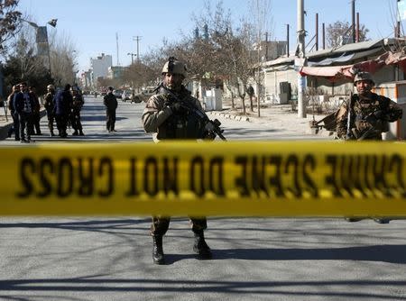 Afghan security forces keep watch at the site of a suicide attack in Kabul, Afghanistan December 28, 2017.REUTERS/Omar Sobhani