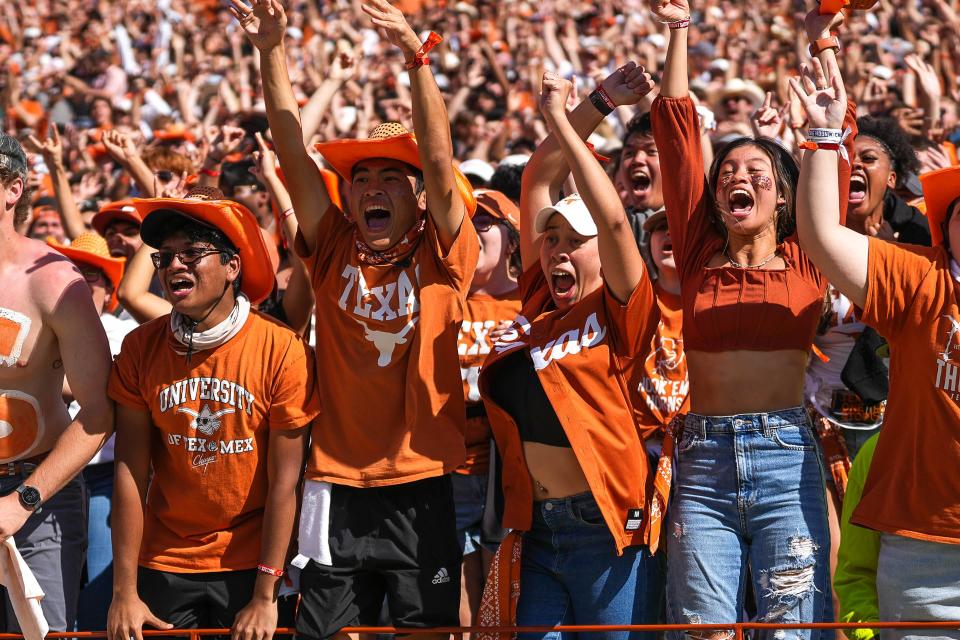 Texas fans erupt after the Longhorns stopped Kansas State on a fourth-and-goal play in overtime, preserving Texas' win in early November. Texas will kick off its season Aug. 31 against Colorado State, a game that will start at 2:30 p.m.