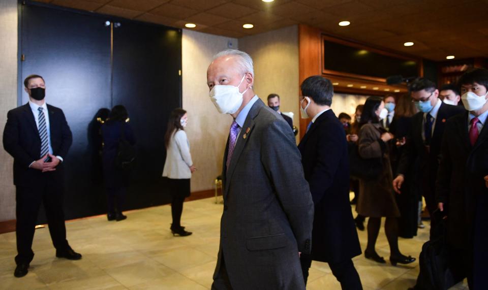 China's Ambassador to the United States, Cui Tiankai, walks past the closed-door morning session of talks between the U.S. and China in Anchorage, Alaska on March 19.