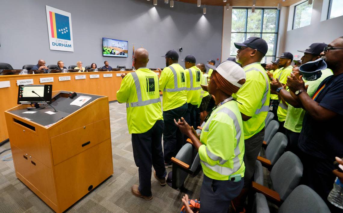 Sanitation workers give Durham Mayor Elaine O’Neal a standing ovation after she spoke during a council work session at City Hall in Durham, N.C., Thursday, Sept. 7, 2023.