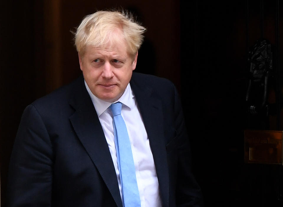 Prime Minister Boris Johnson stepping out of 10 Downing Street, London. 