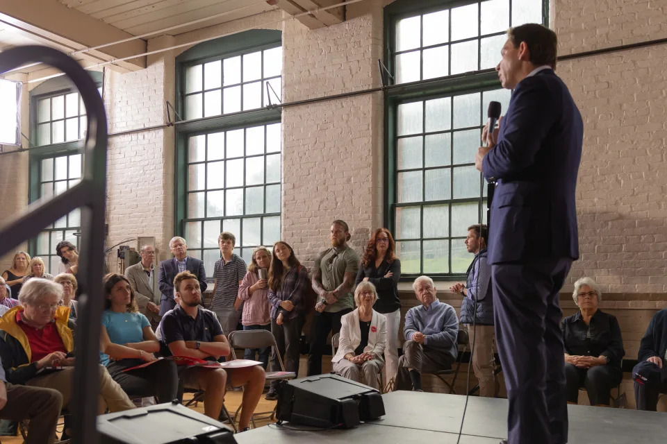 Quinn Mitchell listens to Ron DeSantis at DeSantis Town Hall campaign event in Newport NH on Aug. 19, 2023. Mitchell takes great time and dedication preparing for campaign events, sometimes watching hours worth of interviews from politicians.