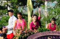 The cast of the MMFF 2012, Sosy Problems, Solenn Heusaff, Heart Evangelista, Bianca King and Rhian Ramos are seen as their float makes its way at the 2012 Metro Manila Film Festival Parade of Stars on 23 December 2012.(Angela Galia/NPPA Images)