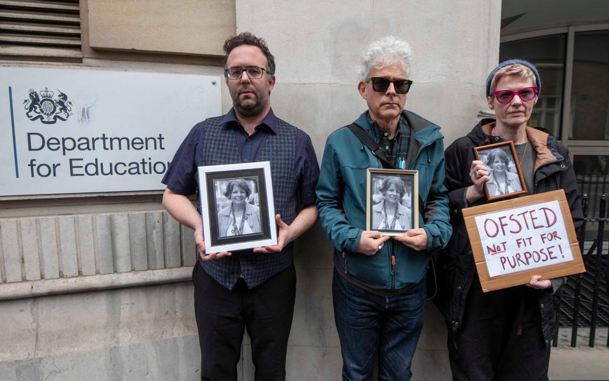 Teachers holding a vigil for Ruth Perry outside the Department for Education in London called for Ofsted to be disbanded - Julian Simmonds for the Telegraph