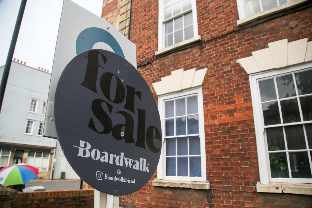 BRISTOL, UNITED KINGDOM - 2021/08/15: A For Sale estate agent board sign erected outside a property in in Bristol. According to property site Rightmove, UK house prices fell in August as demand drops for bigger homes after the government changed its stamp duty tax break for buyers. (Photo by Dinendra Haria/SOPA Images/LightRocket via Getty Images)