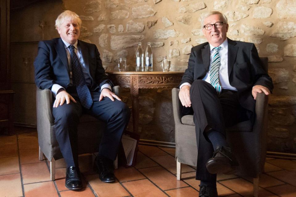 Meagre fare: Boris Johnson and Jean-Claude Juncker at lunch in Luxembourg: PA