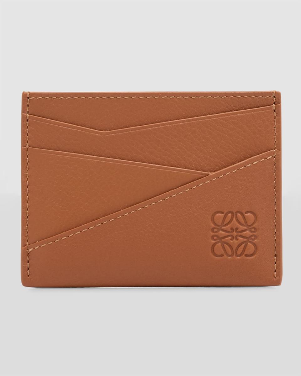 <p><a href="https://go.redirectingat.com?id=74968X1596630&url=https%3A%2F%2Fwww.neimanmarcus.com%2Fp%2Floewe-puzzle-edge-leather-card-holder-prod262840186&sref=https%3A%2F%2Fwww.veranda.com%2Fshopping%2Fg29775990%2Fstocking-stuffers-ideas%2F" rel="nofollow noopener" target="_blank" data-ylk="slk:Shop Now;elm:context_link;itc:0;sec:content-canvas" class="link ">Shop Now</a></p><p>Puzzle Edge Leather Card Holder</p><p>neimanmarcus.com</p><p>$335.00</p>