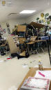 <p>In this April 20, 2018, photo by Jake Mailhiot, desks, chairs and filing cabinets are used to barricade a classroom door in Forest High School in Ocala, Fla., after school officials announced a “Code Red” alert about an active shooter. (Photo: Jake Maihiot via AP) </p>