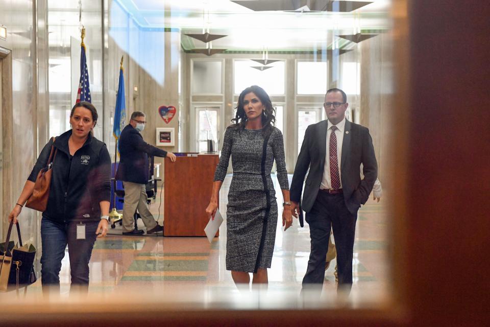 Governor Kristi Noem and Public Safety Secretary Craig Price arrive to give an update on the investigation of the Saturday Sept. 12 crash involving Attorney General Jason Ravnsborg on Tuesday, October 13, at City Hall in Sioux Falls. 