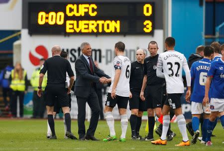 Football Soccer - Carlisle United v Everton - FA Cup Fourth Round - Brunton Park - 31/1/16 Carlisle United manager Keith Curle with Everton's Phil Jagielka at the end of the game Reuters / Phil Noble