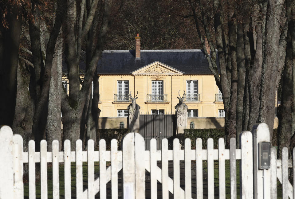 La Lanterne, a presidential residence in Versailles, outside Paris, is pictured Friday, Dec. 18, 2020 in Paris. As French President Emmanuel Macron rides out the coronavirus in a presidential retreat at Versailles, French doctors are warning families who are heading for the holidays to remain cautious because of an uptick in infections — especially at the dinner table. (AP Photo/Michel Euler)