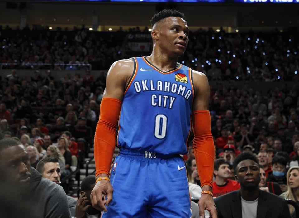 Oklahoma City Thunder guard Russell Westbrook interacts with the crowd during the first half of Game 1 of a first-round NBA basketball playoff series against the Portland Trail Blazers in Portland, Ore., Sunday, April 14, 2019. (AP Photo/Steve Dipaola)