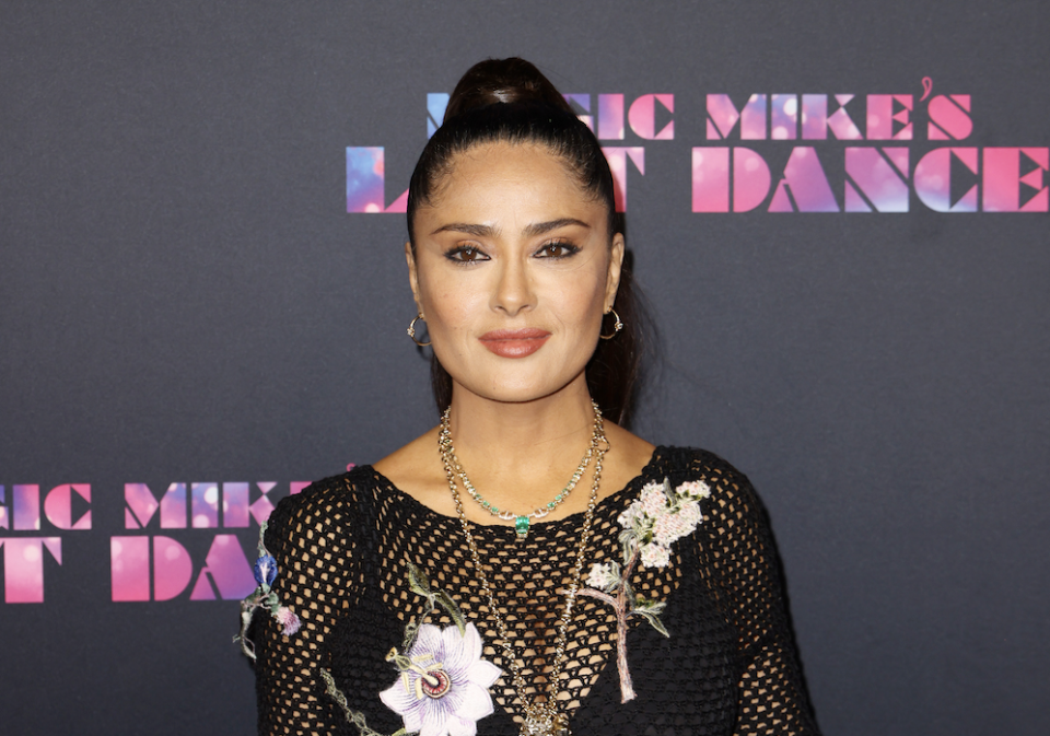 Salma Hayek stuns in a see-through dress at the premiere for Magic Mike's Last Dance. (Photo: Getty Images)