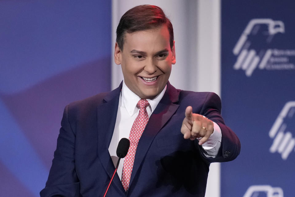 FILE - Rep.-elect George Santos, R-New York, speaks at an annual leadership meeting of the Republican Jewish Coalition Saturday, Nov. 19, 2022, in Las Vegas. Santos, who won a seat in Congress in the November election is under pressure to explain himself amid evidence that he fabricated parts of the life story that endeared him to New York voters. (AP Photo/John Locher, File)