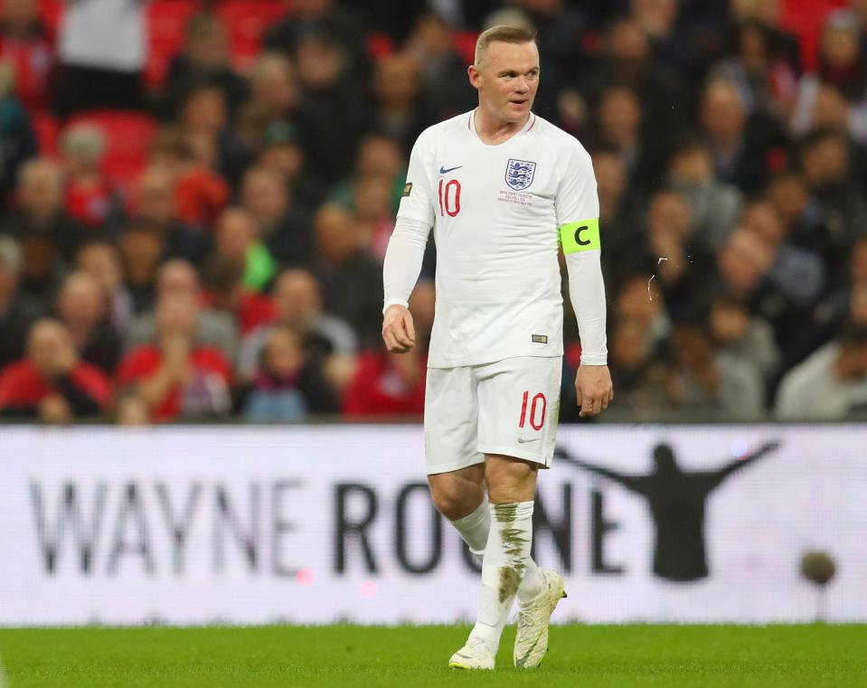 Wayne Rooney 'disappointed' after brother Graham is filmed with his arm around Tommy Robinson