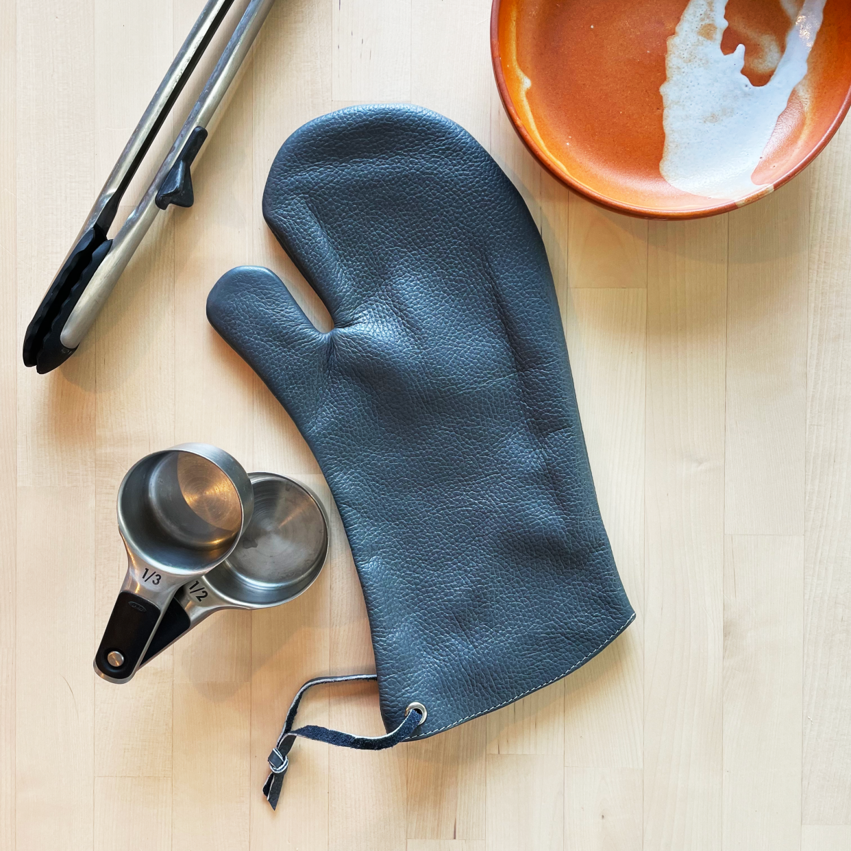 <p><a href="https://greatusefulstuff.com/collections/recommended-products-seguno/products/premium-100-usa-leather-oven-mitt?_pos=4&_sid=761c614ed&_ss=r&variant=42096421601501" rel="nofollow noopener" target="_blank" data-ylk="slk:Shop Now;elm:context_link;itc:0;sec:content-canvas" class="link rapid-noclick-resp">Shop Now</a></p><p>Handcrafted Leather Oven Mitt</p><p>greatusefulstuff.com</p><p>$14.99</p><span class="copyright">Great Useful Stuff</span>