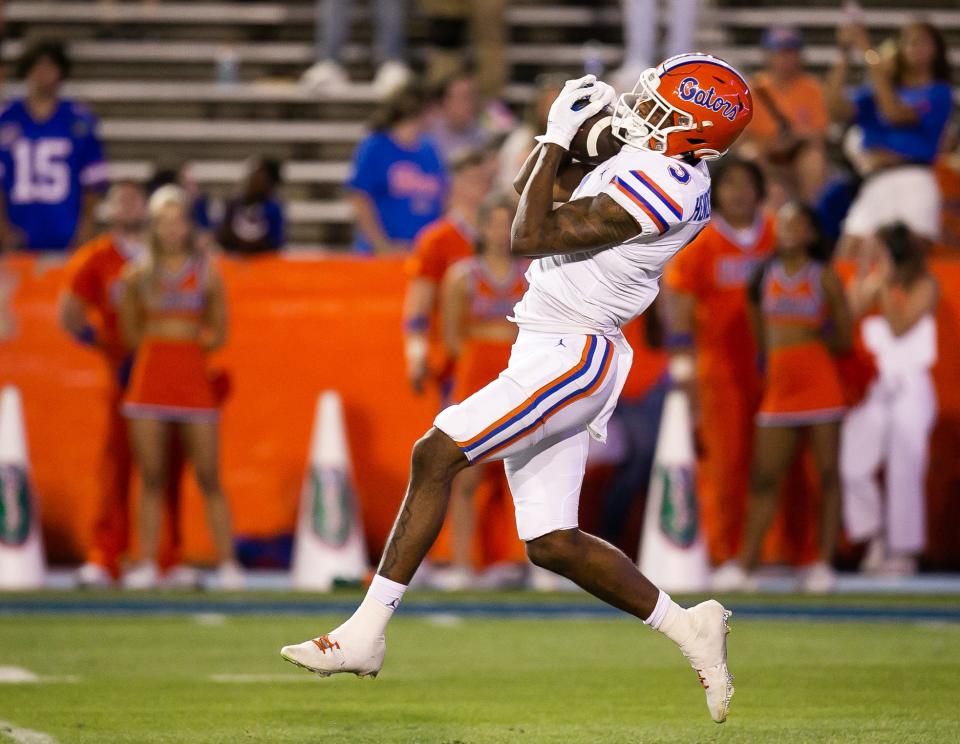 Ex-Florida Gators wide receiver Xzavier Henderson (3) catches a punt return during the second half of the University of Florida Orange & Blue game at Ben Hill Griffin Stadium in Gainesville, FL on Thursday, April 13. Henderson later transferred to Cincinnati.