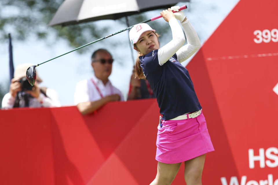 Ayaka Furue of Japan plays a shot on 10th tee during the first round of the HSBC Women's Wold Championship at the Sentosa Golf Club in Singapore Thursday, Feb. 29, 2024. (AP Photo/Danial Hakim)