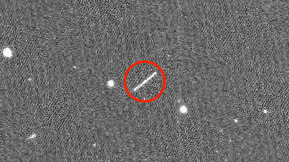 The circled streak in the center of this image is asteroid 2020 QG, which came closer to Earth than any other nonimpacting asteroid on record. It was detected by the Zwicky Transient Facility on Sunday, Aug. 16 at 12:08 a.m. EDT (Saturday, Aug. 15 at 9:08 p.m. PDT).  / Credit: ZTF/Caltech Optical Observatories