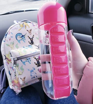 Or a water bottle with a built-in pill organizer