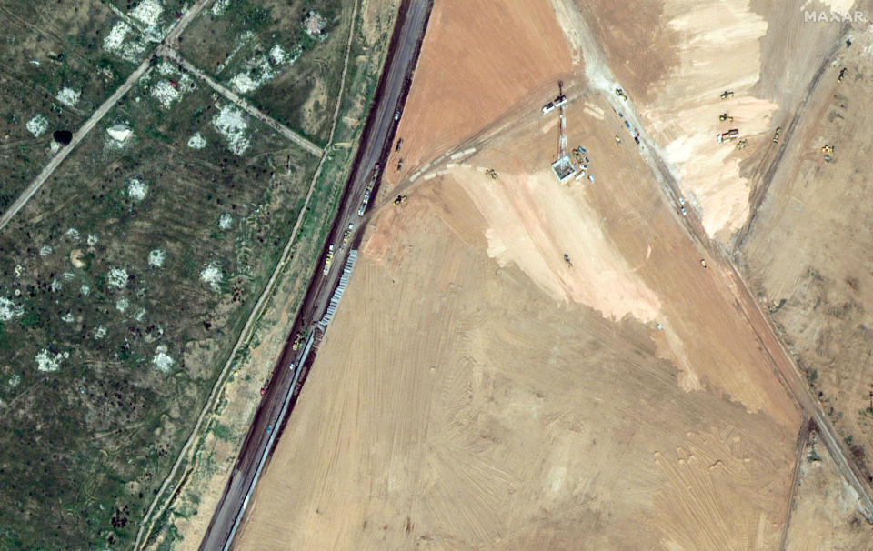A satellite image shows the construction of a wall along the Egypt-Gaza border near Rafah, February 15, 2024. Maxar Technologies/Handout via REUTERS    THIS IMAGE HAS BEEN SUPPLIED BY A THIRD PARTY. NO RESALES. NO ARCHIVES. MANDATORY CREDIT. DO NOT OBSCURE LOGO.