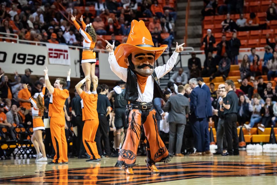 Oklahoma State Cowboys mascot Pistol Pete is shown during a timeout in the game against the West Virginia Mountaineers at Gallagher-Iba Arena. (USA Today)