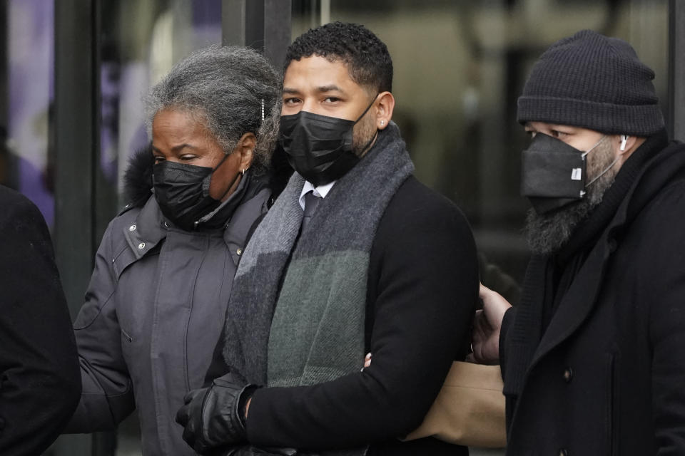 Actor Jussie Smollett departs Tuesday, Dec. 7, 2021, with his motherJanet, the Leighton Criminal Courthouse after day six of his trial in Chicago. Closing arguments are scheduled for Wednesday, in Chicago. (AP Photo/Charles Rex Arbogast)
