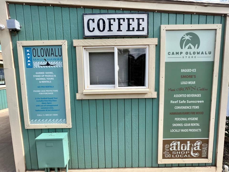 green building with coffee sign on front