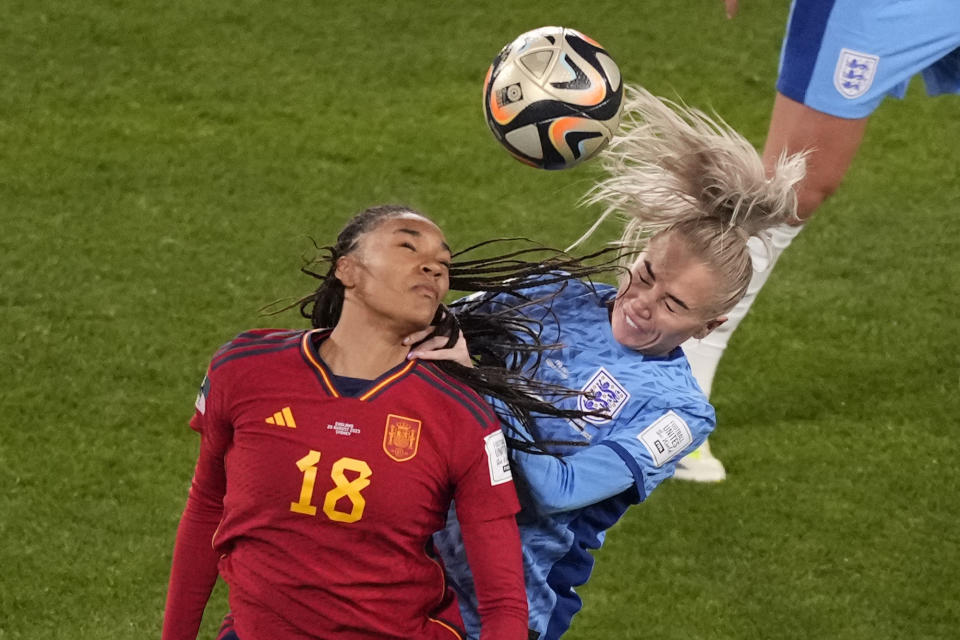 Spain's Salma Paralluelo, left, fights for the ball against England's Alex Greenwood during the Women's World Cup soccer final between Spain and England at Stadium Australia in Sydney, Australia, Sunday, Aug. 20, 2023. (AP Photo/Mark Baker)