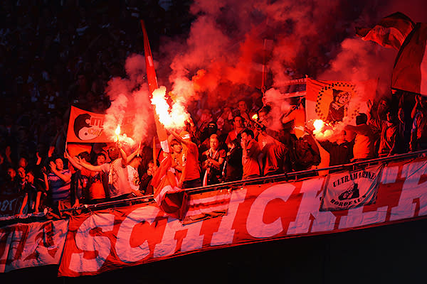 FC Bayern Muenchen fans set off flares during the UEFA Champions League final.