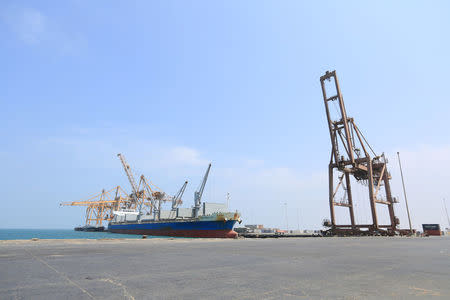 A ship is docked to unload a cargo of wheat at the port of Hodeida, Yemen April 1, 2018. REUTERS/Abduljabbar Zeyad