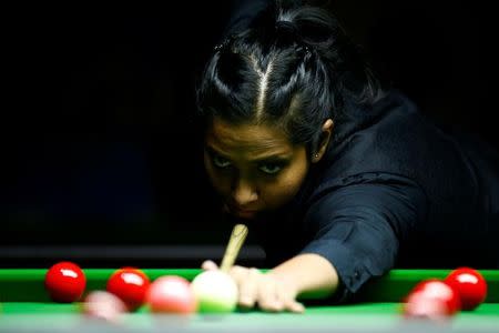 Vidya Pillai of India plays a shot during her final match against Ng On Yee of Hong Kong during the Eden World Women's Snooker Championship in Singapore March 19, 2017. REUTERS/Yong Teck Lim/Files