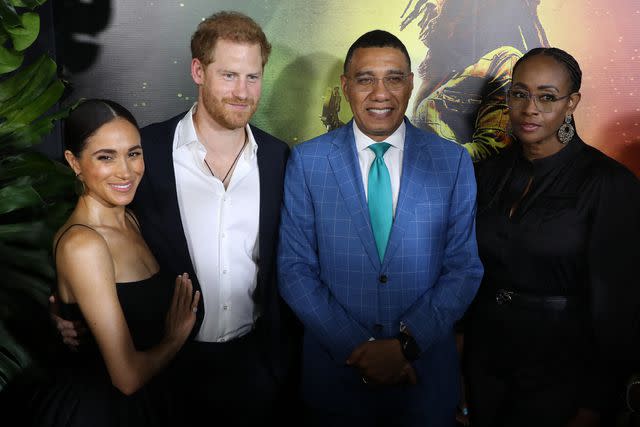 <p>MEGA</p> Meghan Markle and Prince Harry with Jamaican Prime Minister of Jamaica Andrew Holness and his wife, Juliet Holness