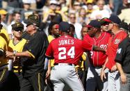 <p>Managers Dusty Baker #12 of the Washington Nationals and Clint Hurdle #13 of the Pittsburgh Pirates in action during a bench clearing altercation in the third inning against the Pittsburgh Pirates at PNC Park on September 25, 2016 in Pittsburgh, Pennsylvania. (Photo by Justin K. Aller/Getty Images) </p>