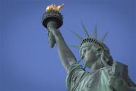 The Statue of Liberty is pictured on Liberty Island in New York, October 13, 2013. REUTERS/Carlo Allegri