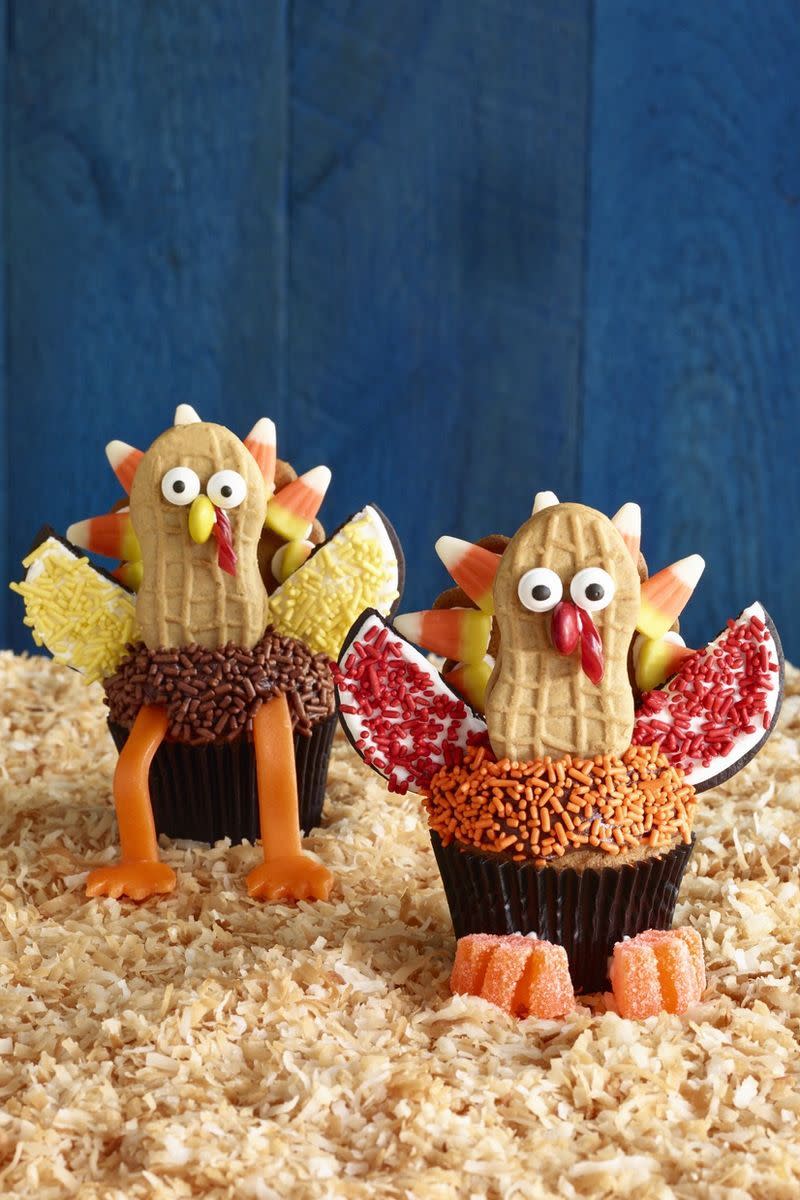 <p>These <a href="https://www.womansday.com/food-recipes/food-drinks/news/g1944/thanksgiving-desserts/" rel="nofollow noopener" target="_blank" data-ylk="slk:Thanksgiving treats;elm:context_link;itc:0;sec:content-canvas" class="link ">Thanksgiving treats</a> are almost too fun to gobble up, but you will enjoy every minute of doing so!</p><p><a href="https://www.womansday.com/food-recipes/food-drinks/a8243/turkey-cupcakes/" rel="nofollow noopener" target="_blank" data-ylk="slk:Get the Turkey Cupcakes recipe.;elm:context_link;itc:0;sec:content-canvas" class="link "><em><strong>Get the Turkey Cupcakes recipe.</strong></em></a></p><p><strong>What You'll Need: </strong><a href="https://www.amazon.com/Dean-Jacobs-Autumn-Accents-Sprinkles/dp/B00H1C8ZDY?tag=syn-yahoo-20&ascsubtag=%5Bartid%7C10070.g.1966%5Bsrc%7Cyahoo-us" rel="nofollow noopener" target="_blank" data-ylk="slk:Fall sprinkles mix;elm:context_link;itc:0;sec:content-canvas" class="link ">Fall sprinkles mix</a> ($13, Amazon)<br></p>